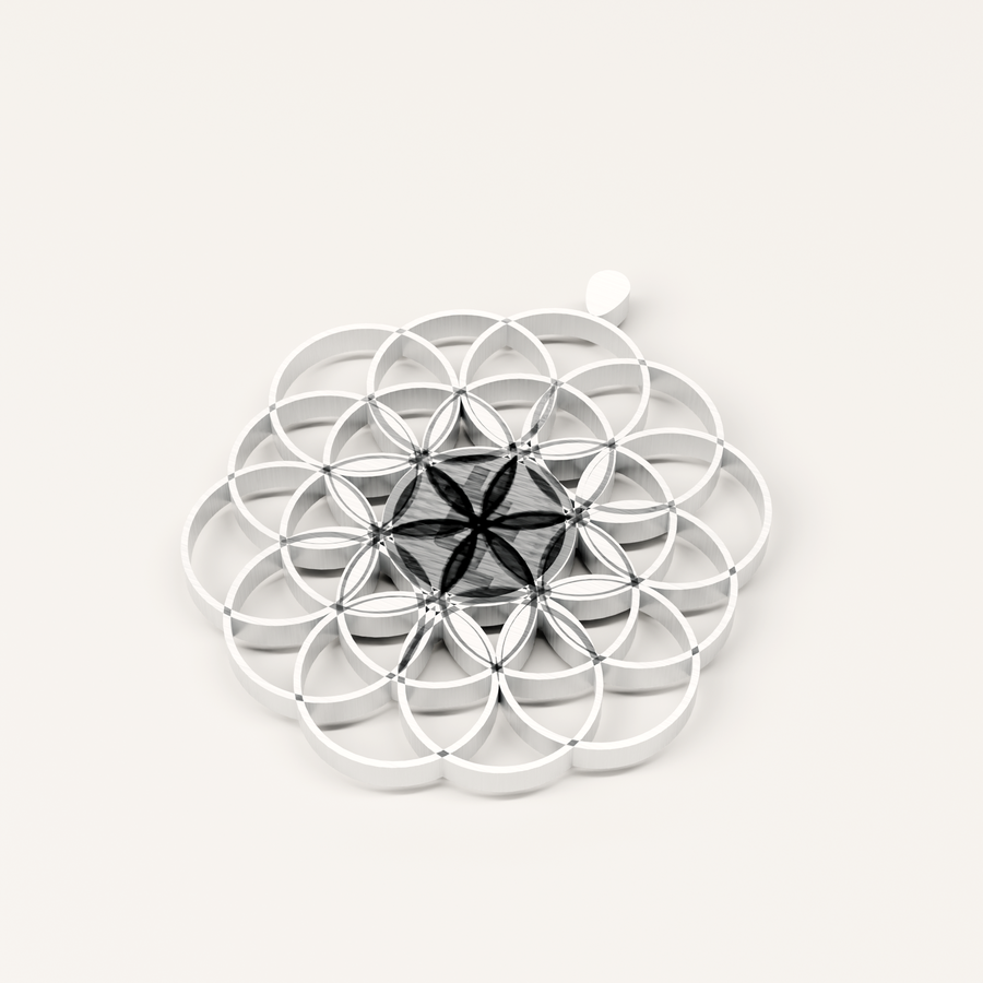 Flower-of-life pendant, openwork acid-etched through 316L stainless steel.